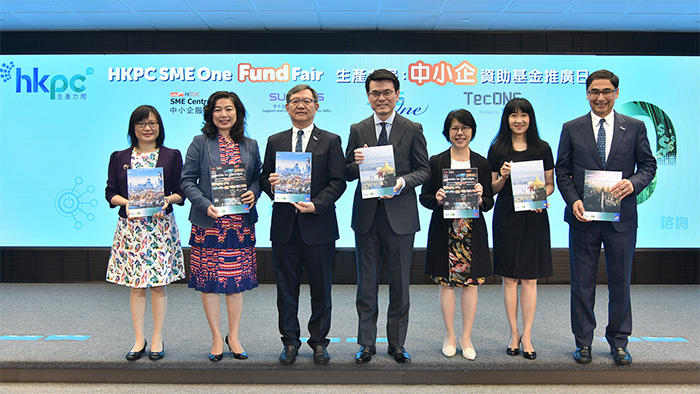 Mr Edward Yau, Secretary for Commerce and Economic Development (centre); Mr Willy Lin, Chairman of HKPC (third from left); Ms Annie Choi, Permanent Secretary for Innovation and Technology (third from right); Ms Rebecca Pun, Commissioner for Innovation and Technology (first from left); Ms Salina Yan, Director-General of Trade and Industry (second from left) ; Ms Margaret Fong, Executive Director of the Hong Kong Trade Development Council (second from right); Mr Mohamed Butt, Executive Director of HKPC (first from right) showcased the freshly launched guidebook of “Reindustrialisation in Hong Kong and Opportunities and Limitations for Hong Kong Enterprises Entering into ASEAN”. 