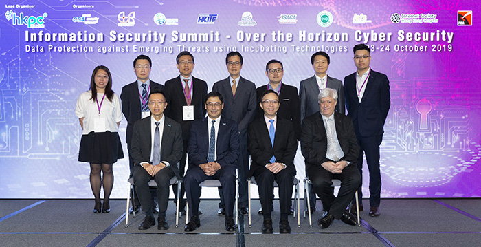 Mr Victor Lam, Government Chief Information Officer of the HKSAR (front row, second from right);      Mr Mohamed Butt, Executive Director of HKPC (front row, second from left); Mr Edmond Lai, Chief Digital Officer of HKPC (front row, first from left), and Mr Dale Johnstone, Chairman of the Information Security Summit 2019 Organising Committee, pose for a photo with representatives of the Summit organisers at the opening of the Summit