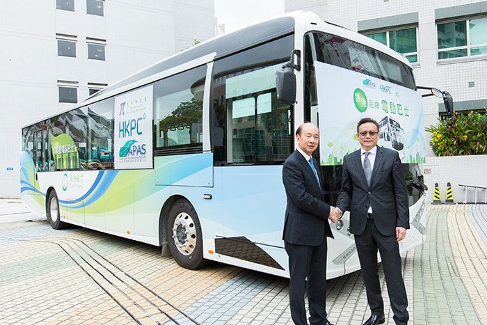 Mr Stanley Lau, Chairman of HKPC (left), and Mr Andrew Yung, Chairman and CEO of Green Dynamic Electric Vehicle Limited, pose with the first 'Made by Hong Kong' electric bus