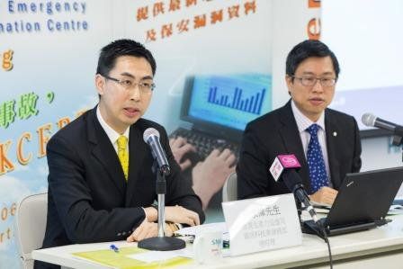 Mr Wilson Wong, General Manager (IT Industry Development) of HKPC (left), and Mr Leung Siu-Cheong, Senior Consultant of the Hong Kong Computer Emergency Response Team Coordination Centre of HKPC, review the information security situation in Hong Kong in 2014, and introduce the upcoming trends