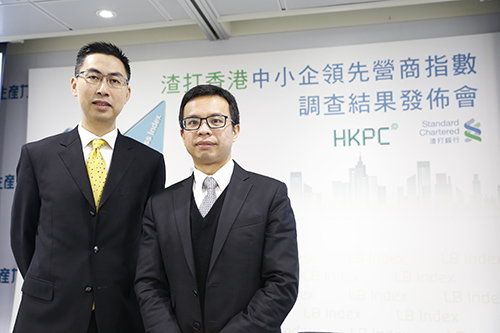 Mr Wilson Wong (left), Acting Director (Business Management) of HKPC; and Mr Kelvin Lau, Senior Economist of Standard Chartered Hong Kong, announce the survey results of the 