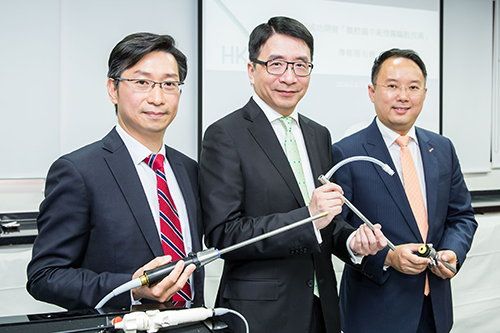 Dr Lawrence Cheung, Director (Technology Development) of HKPC (middle); Mr Bryan So, Principal Consultant, Automotive and Electronics Division of HKPC (right); and Prof Philip Chiu, Director of both CUHK Jockey Club Minimally Invasive Surgical Skills Centre and Chow Yuk Ho Technology Centre for Innovative Medicine, introduce features of the surgical smoke evacuation technology for laparoscopic surgery.