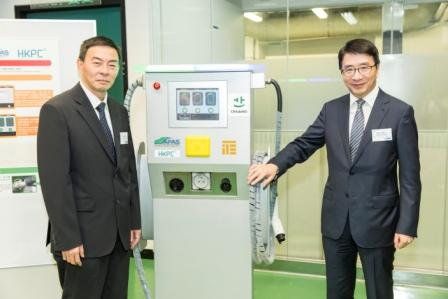 Dr Lawrence Cheung, General Manager, APAS, HKPC (right) and Mr Vincent Lau, CEO of ITE Engineering Limited, introduce the 50kW fast charging station, which is the only locally developed EV charging station in Hong Kong and the Mainland that has passed the most widely adopted international standard on EV charging systems.  