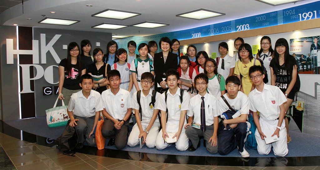 Mrs Agnes Mak, Executive Director of HKPC, receives the first group of visitors to the new HKPC Gallery - 25 students from different secondary schools