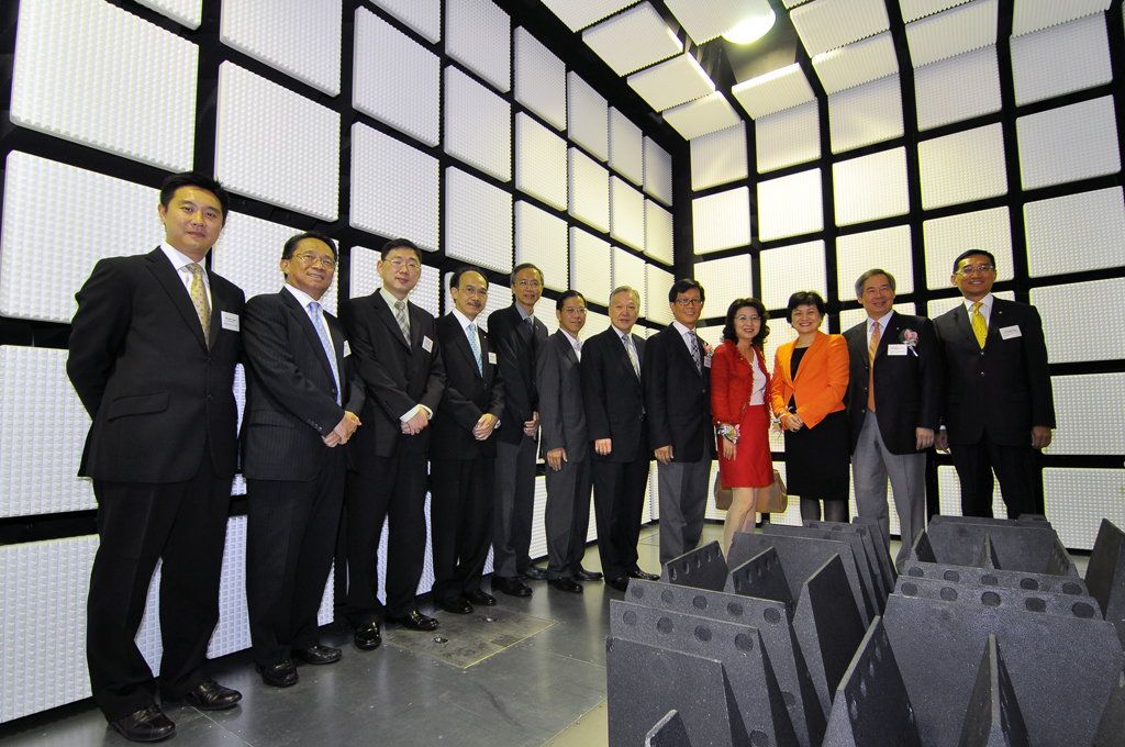 Professor Ching Pak-chung (fifth from right), Chairman of the Hong Kong Council for Testing and Certification; Miss Janet Wong (fourth from right), Commissioner for Innovation and Technology; HKPC Executive Director, Mrs Agnes Mak (third from right), and Chairman, Mr Clement Chen (second from right), inside the new EMC chamber with HKPC council members and other VIP guests