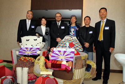 Mr Edmund Sung, Director (Business Consulting) of HKPC (first from left); Dr Raymond Choy, President of IEA (third from left); and Mr Raymond Cheng, General Manager (Business Management) of HKPC (first from right), posed for a photo with representatives from the showcase exhibitors