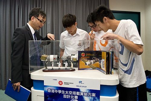 Secondary students attending the launch ceremony are keenly interested in space science models