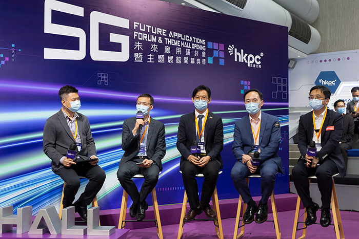 Representatives from four leading 5G telecommunications operators in Hong Kong, including Mr Kelvin Ho, Wireless Network Director of 3 Hong Kong (second from left); Mr Gordon Guo, Corporate Market Director of China Mobile Hong Kong Company Limited (third from left); Mr Henry Wong, Head of Strategic Wireless Technology & Core Networks Engineering of HKT Limited (second from right); and Mr Daniel Leung, General Manager, Enterprise Solutions Development of SmarTone Telecommunications Holdings Limited (first from right); took part in a panel discussion entitled “The New World of Connectivity” after the opening ceremony to exchange their insights on the wider applications of 5G technology, moderated by Mr Roy Law, Chairman of Wireless Technology Industry Association (first from left)
