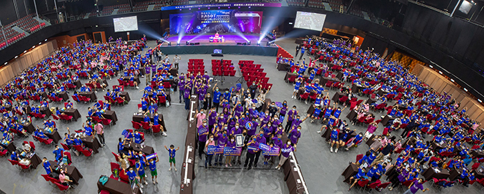 Group photo of the participants of the “Mass Robot Programming for New World Record” event after successfully setting the new world record.
