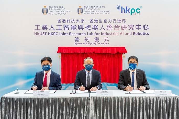 (From left) Prof Charles Ng Wang-Wai, Vice-President for Graduate Support of HKUST (GZ) and CLP Holdings Professor of Sustainability of HKUST; Prof Tim Cheng, Vice-President for Research and Development of HKUST; and Mr Mohamed Butt, Executive Director of HKPC, sign the agreement to establish HKUST-HKPC Joint Research Lab for Industrial AI and Robotics.