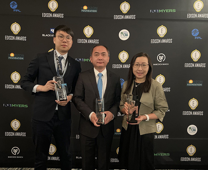 At the 2023 Edison Awards Gala held in Fort Myers, Florida, USA, representatives of the R&D teams for the three award-winning technologies, including Dr Ming GE, General Manager of Robotics and Artificial Intelligence Division of HKPC (centre), Ms Angela YU, Deputy Head of HealthTech and Chinese Medicine of Green Living and Innovation Division of HKPC (right), and Mr Justin LAU, Consultant of Industry 4.0 of Greater Bay Area Business Development Division of HKPC (left), received the awards on stage.