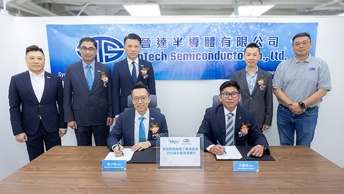 Witnessed by Hon Sunny TAN, Chairman of HKPC (Third from left in the back row), Mr Mohamed D. BUTT, Executive Director of HKPC (Second from left in the back row), Mr Raymond SHAN, General Manager of the New Industrialisation Division of HKPC (First from left in the back row), Mr Louis WU, Chief Executive Officer of JinTech Semiconductor (Second from right in the back row), Mr Frankie KUO, Chief Sales Officer of JinTech Semiconductor (First from right in the back row), the MoU was signed by Mr Edmond LAI (Left in the front row), Chief Digital Officer of HKPC, and Mr Robert WANG, Chairman of JinTech Semiconductor (Right in the front row), at JinTech Semiconductor's newly established advanced semiconductor memory testing factory in Hong Kong.