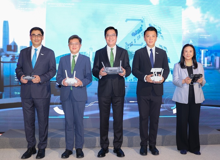 Mr Michael Wong Wai-lun, GBS, JP, Deputy Financial Secretary (center); Hon Sunny Tan, Chairman of HKPC (second from right); Hon Dr. Elizabeth Quat, SBS, JP, Founding President of the Greater Bay Area Low-Altitude Economy Alliance (first from right); Mr Kevin CHOI, JP, Permanent Secretary for Transport and Logistics of the Government of the Hong Kong Special Administrative Region (second from left); and Mr Mohamed D. Butt, Executive Director of HKPC (first from left), jointly witnessed a new milestone for Hong Kong in advancing airspace innovation and new quality productivity.